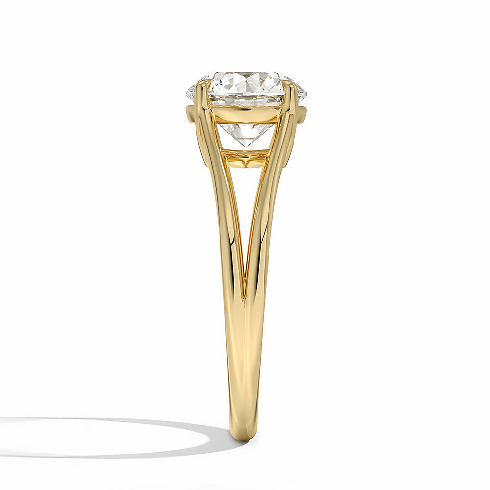 Yellow gold solitaire ring with a brilliant moissanite center stone, side view