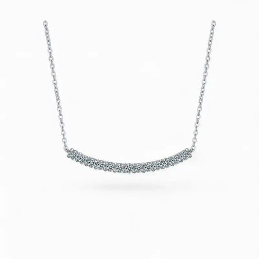 Moissanite bar pendant necklace with silver chain on white background