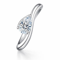 Sterling silver ring with pear-shaped moissanite stone, minimalist jewelry design