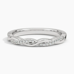 Twisted band moissanite ring in white metal with pavé-set stones, elegant jewelry design