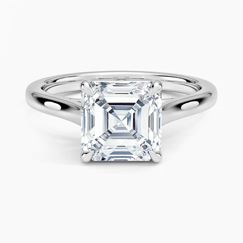 Asscher cut moissanite solitaire engagement ring in a polished silver band