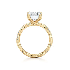 Twisted yellow gold ring with moissanite center stone and pavé accents
