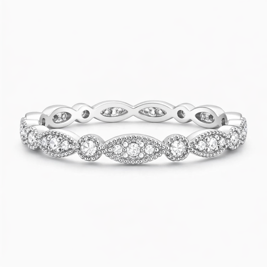 Elegant white gold moissanite eternity band with intricate marquise and round settings
