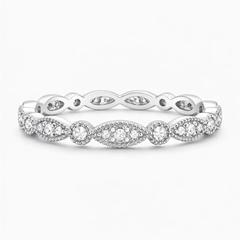 Elegant white gold moissanite eternity band with intricate marquise and round settings