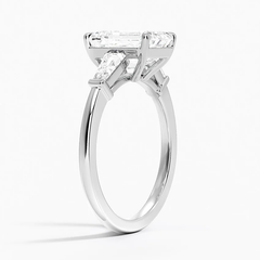 Elegant moissanite engagement ring with a large rectangular stone on a silver band