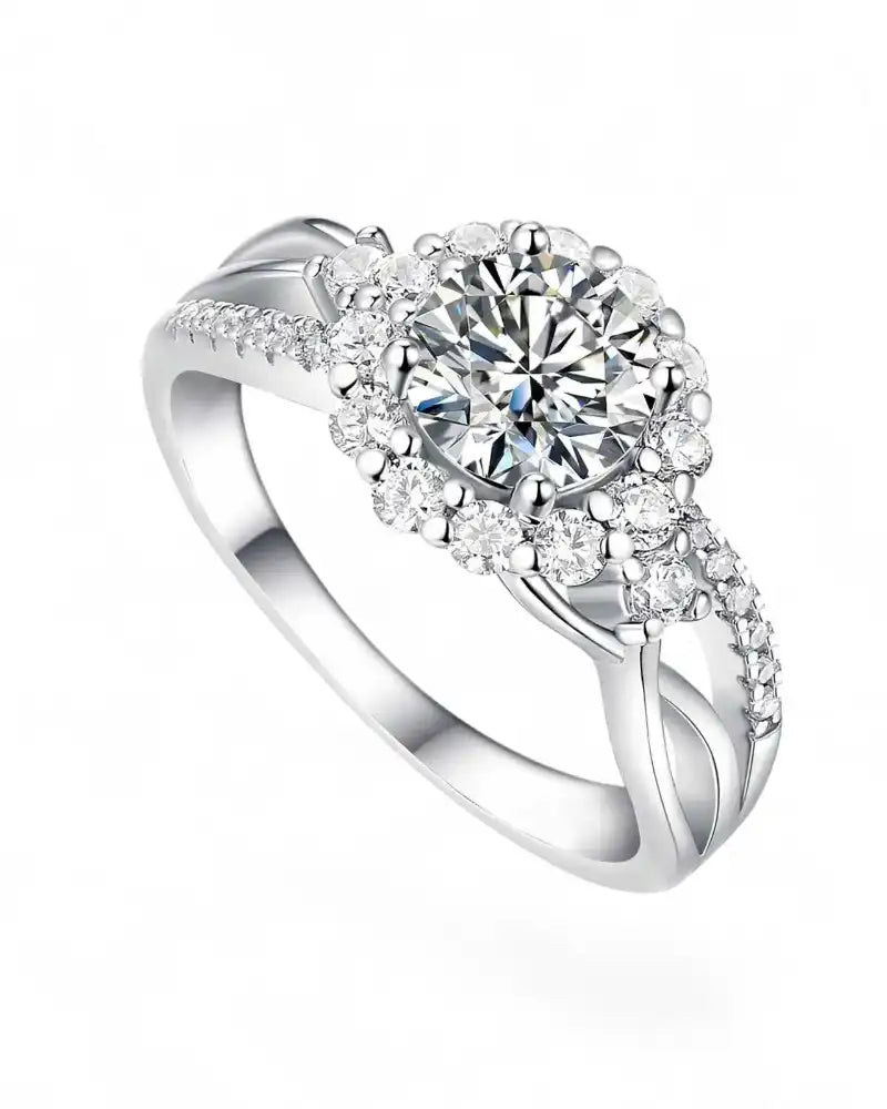 Moissanite halo engagement ring with split shank in white metal, round brilliant center stone