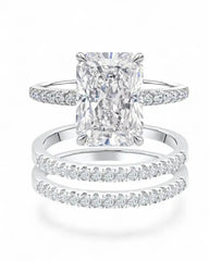 Radiant cut moissanite engagement ring set with pavé bands in white gold
