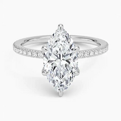 Marquise cut moissanite engagement ring with pavé diamond band on white background