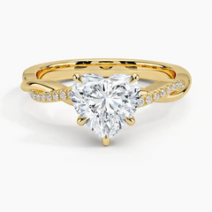 Heart-shaped moissanite gold ring with pavé band, luxury engagement jewelry