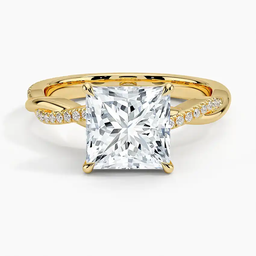 Princess cut moissanite engagement ring with gold band and pavé accent stones
