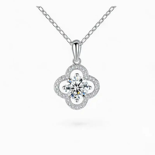 Moissanite flower pendant necklace in white gold with round center stone and pavé accents