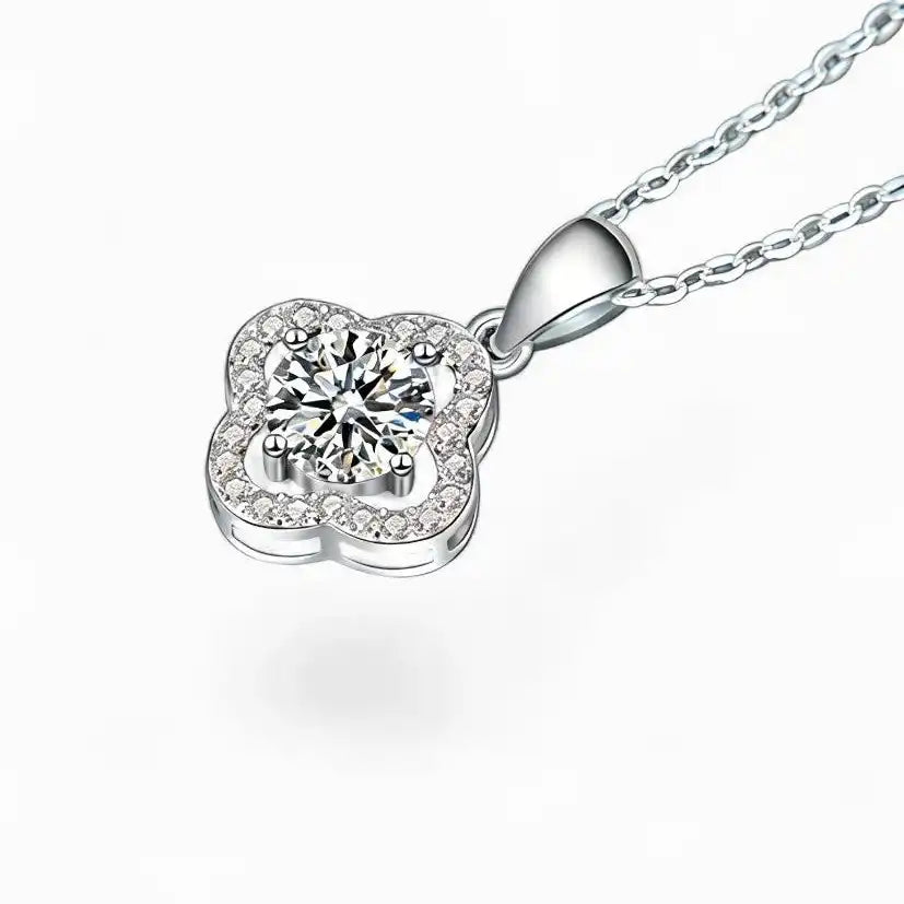 Moissanite flower pendant necklace with pavé halo on silver chain, luxury jewelry