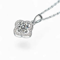 Moissanite flower pendant necklace with pavé halo on silver chain, luxury jewelry