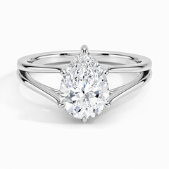 Pear-shaped moissanite solitaire ring with split shank in polished silver setting