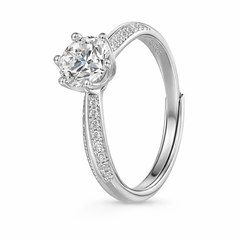 Silver moissanite engagement ring with pavé band and round brilliant center stone