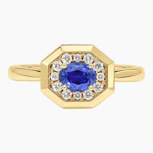 Vintage-inspired 1 Carat Oval Blue Sapphire and Moissanite Hexagon Halo Engagement Ring in 18K Gold Plated Sterling Silver