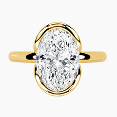 Half Bezel Oval Moissanite Ring