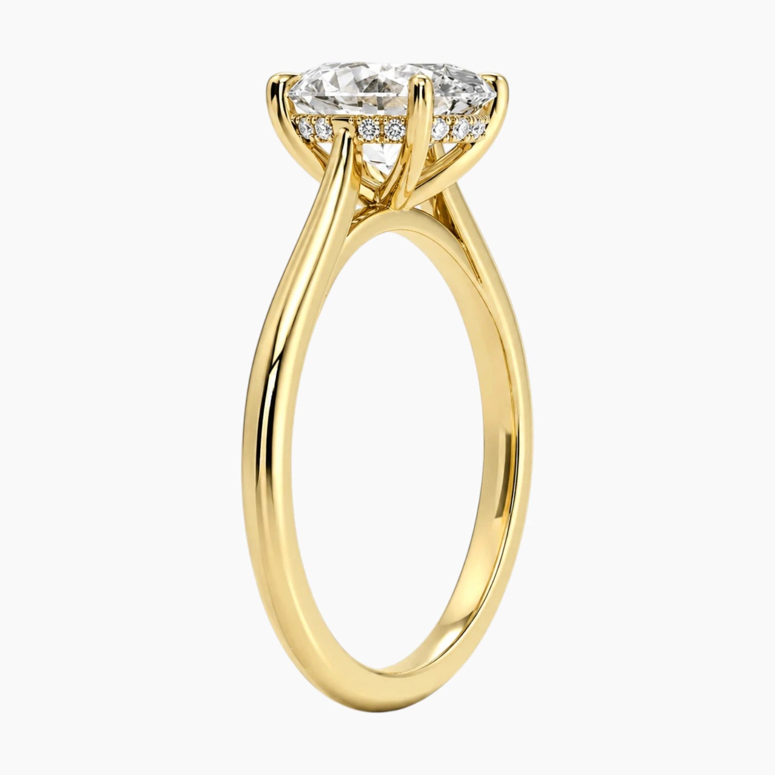 Oval moissanite cathedral engagement ring in yellow gold with hidden halo, side profile