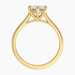 Rear view of an oval moissanite cathedral engagement ring in yellow gold with a hidden halo.