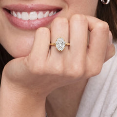 Émbrienne Oval Claw-Set Moissanite Ring