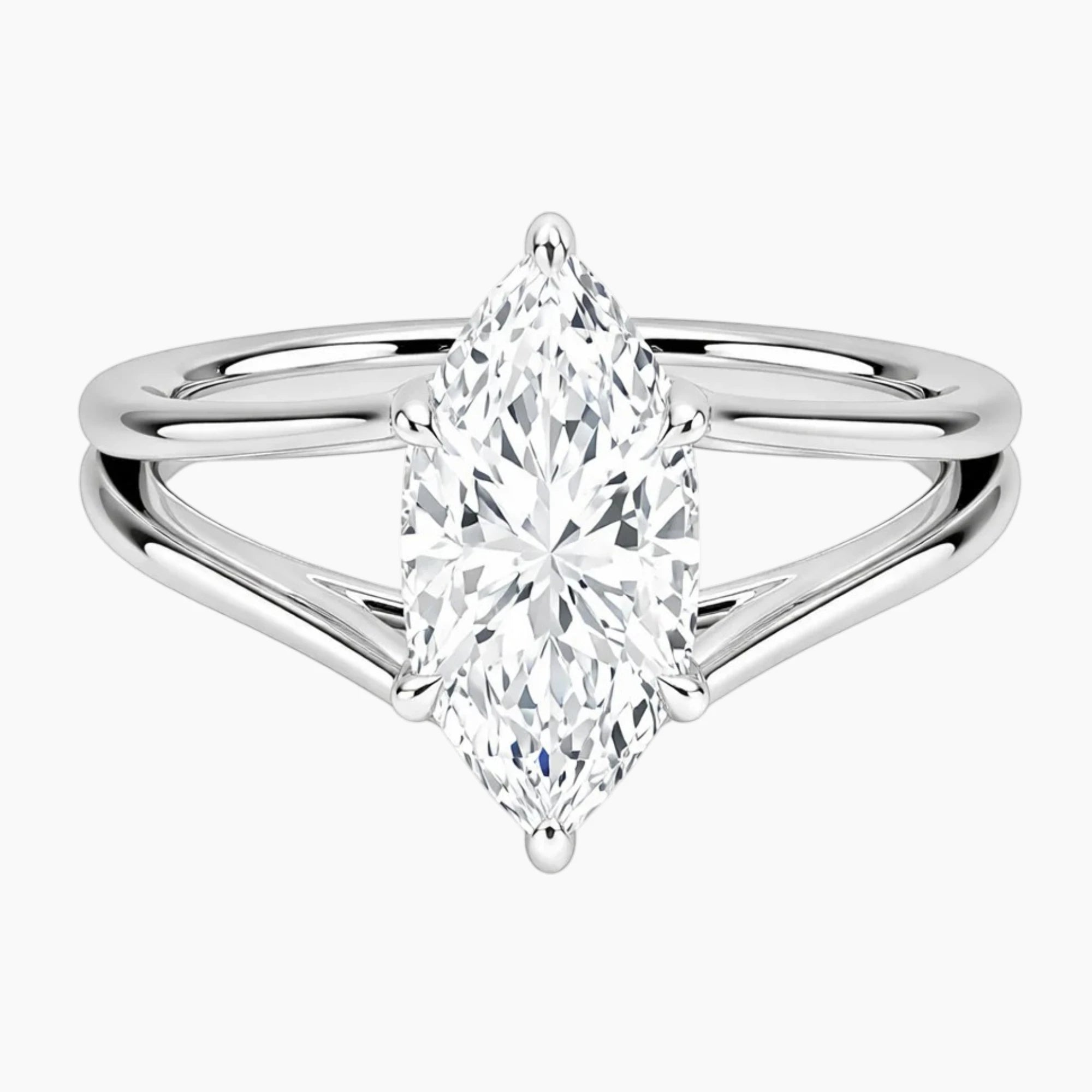 Marquise cut moissanite solitaire ring with split shank band in polished metal setting