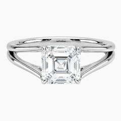 Asscher cut moissanite engagement ring with split shank in white metal setting