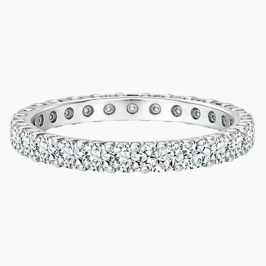 Sterling silver eternity band set with round moissanite stones, elegant fine jewelry