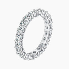 Sterling silver eternity band set with round moissanite stones, elegant fine jewelry