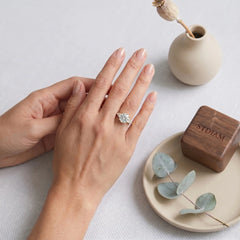 Opera Three Stone Round Moissanite Ring
