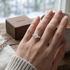 The Starlight Graduated Round Moissanite Five-Stone Ring