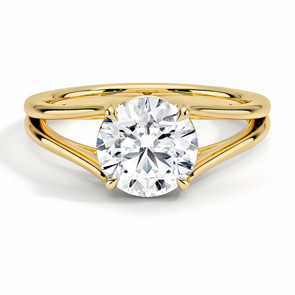 Round moissanite solitaire engagement ring with split shank yellow gold band