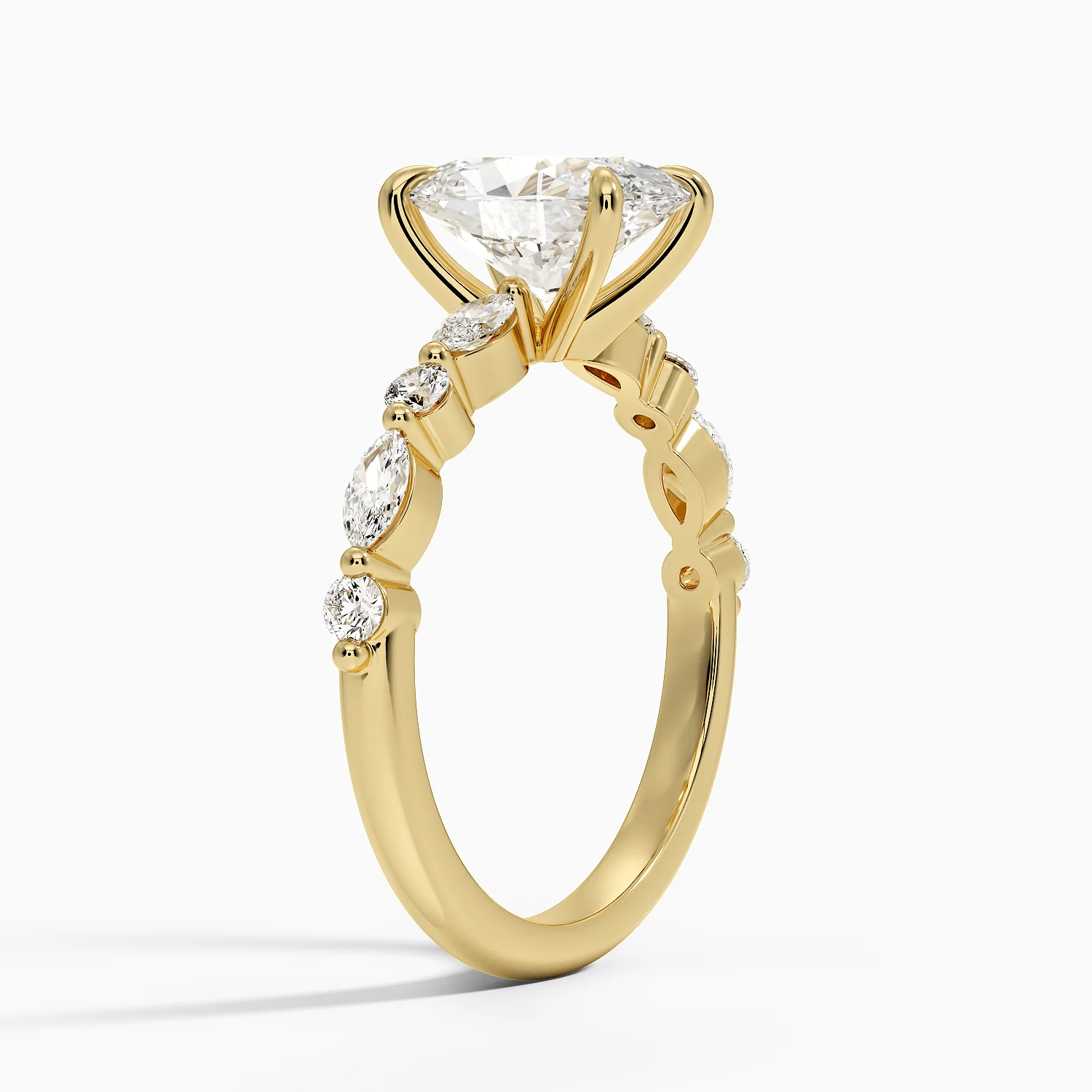 Yellow gold moissanite engagement ring with marquise and round stones on band