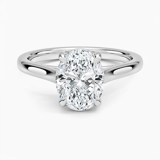 Oval cut moissanite engagement ring in a sleek silver solitaire setting