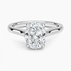 Oval cut moissanite engagement ring in a sleek silver solitaire setting