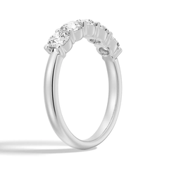 White gold moissanite eternity band with round brilliant stones, elegant jewelry