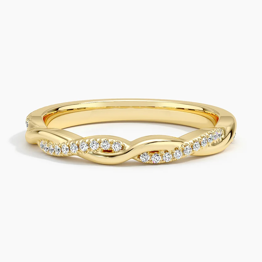 Gold twisted band moissanite ring with pavé-set stones, elegant and ethical fine jewelry