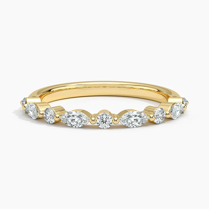 Gold band ring with round and marquise cut moissanite stones, elegant fine jewelry