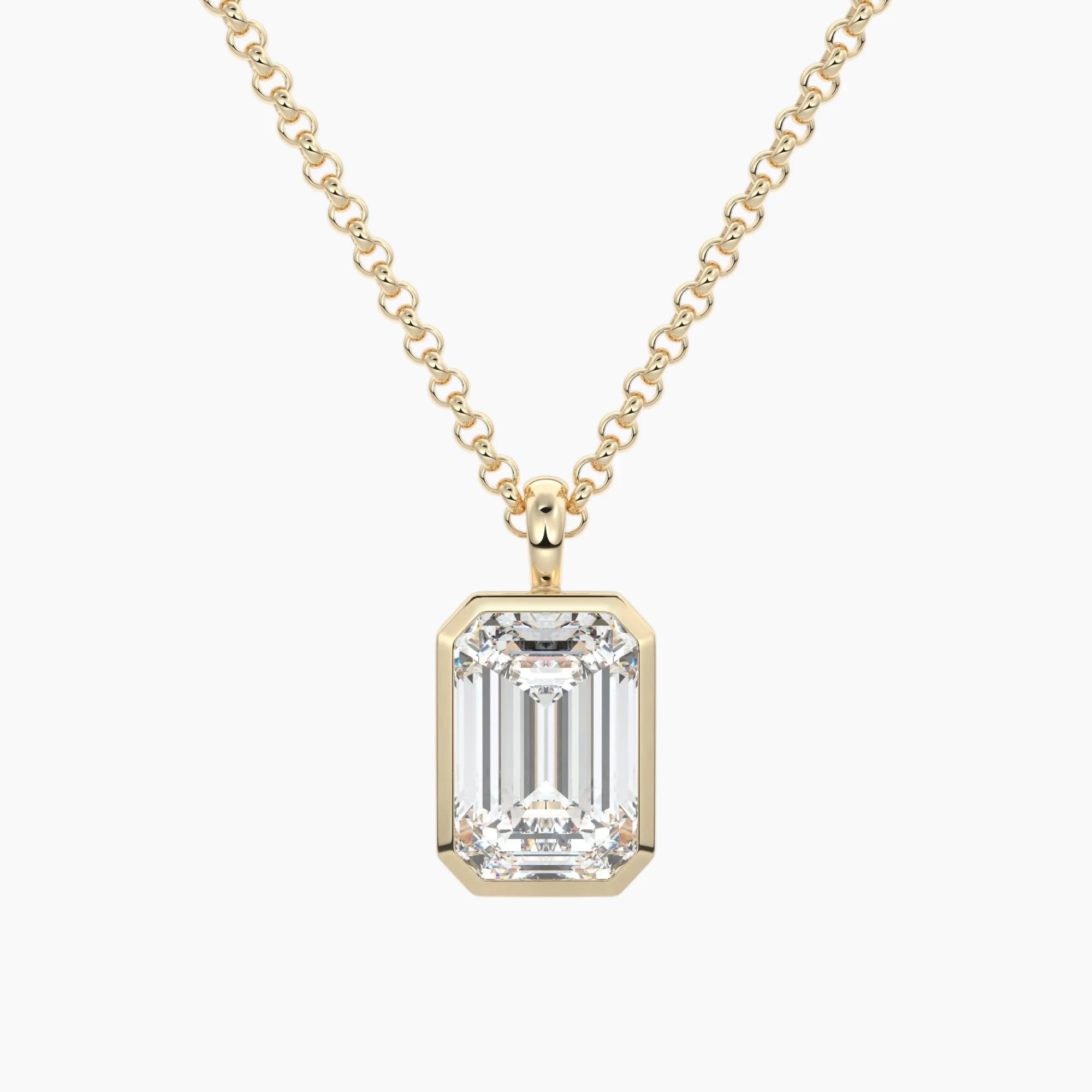 Emerald cut moissanite pendant necklace in yellow gold setting on a chain