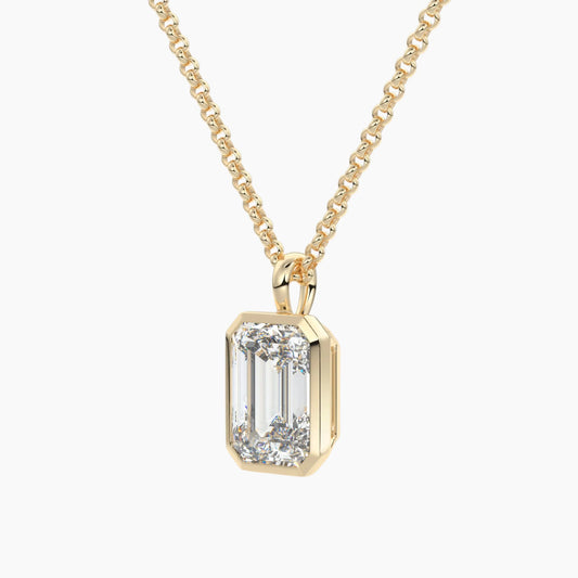 Gold chain necklace with emerald-cut moissanite pendant in solitaire setting