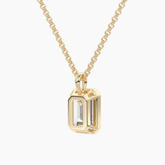 Gold chain necklace with emerald cut moissanite pendant, minimalist jewelry style