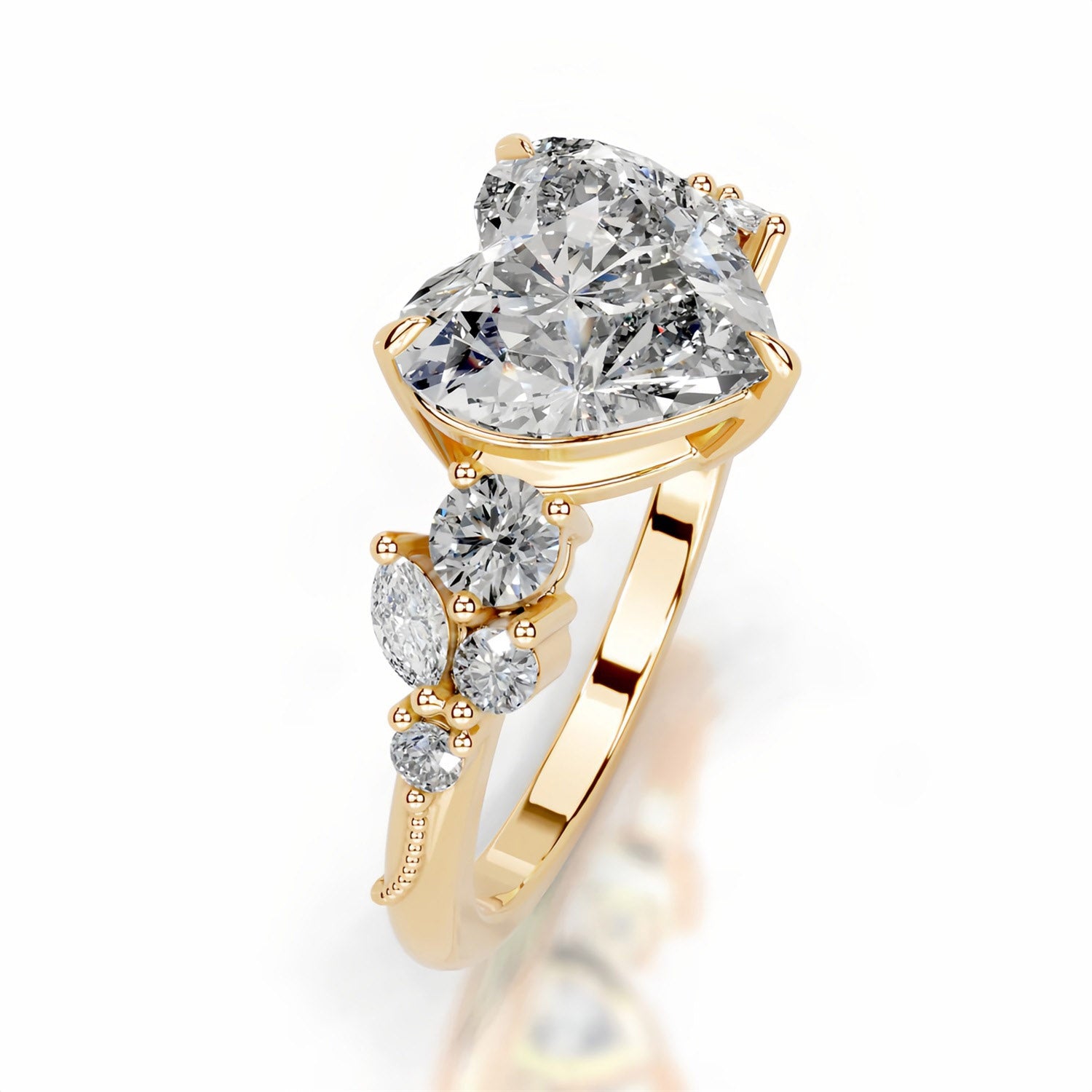 Gold ring with heart-shaped moissanite center stone and side accent stones