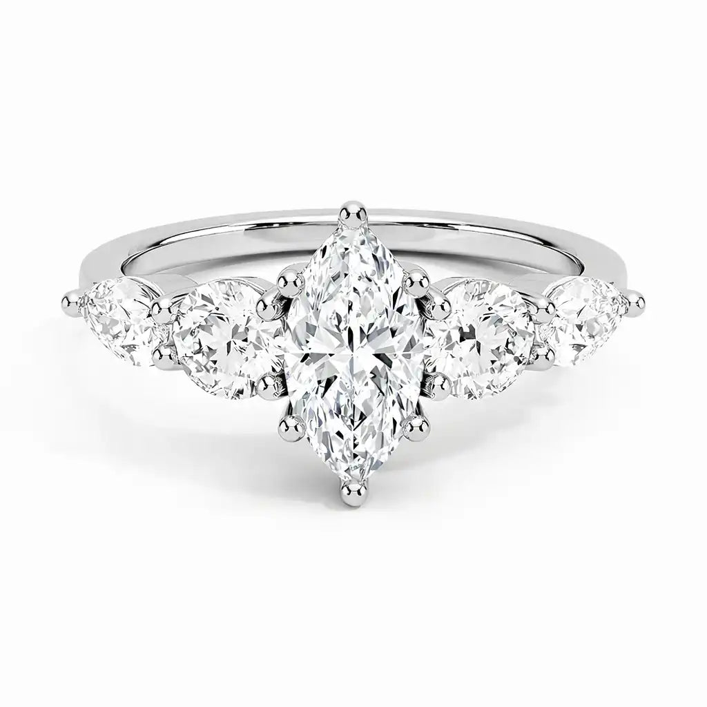 Marquise cut moissanite engagement ring with side stones in a white gold setting