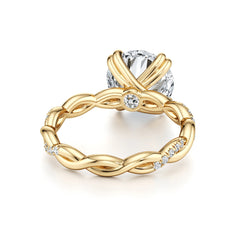 Gold twisted band moissanite engagement ring with round brilliant center stone