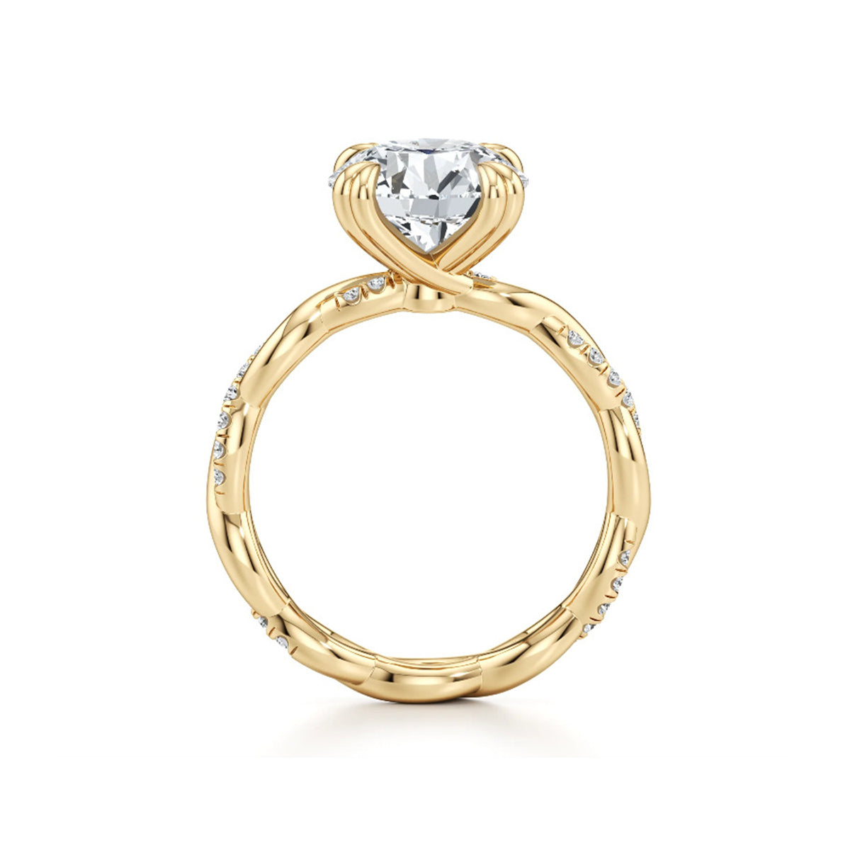 Gold moissanite engagement ring with twisted band and pavé stones against white background