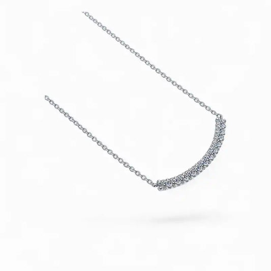 Moissanite curved bar necklace with round gemstones on a delicate silver chain