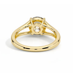 Yellow gold solitaire ring with round moissanite gemstone in prong setting