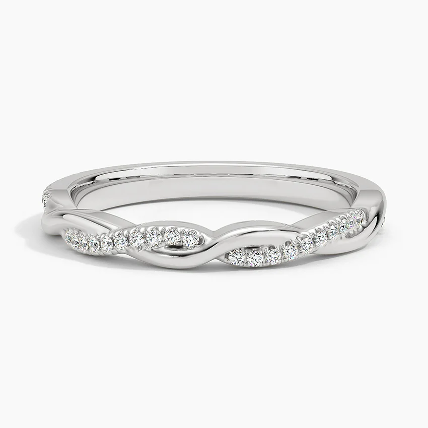 Twisted band moissanite ring in white metal with pavé-set stones, elegant jewelry design
