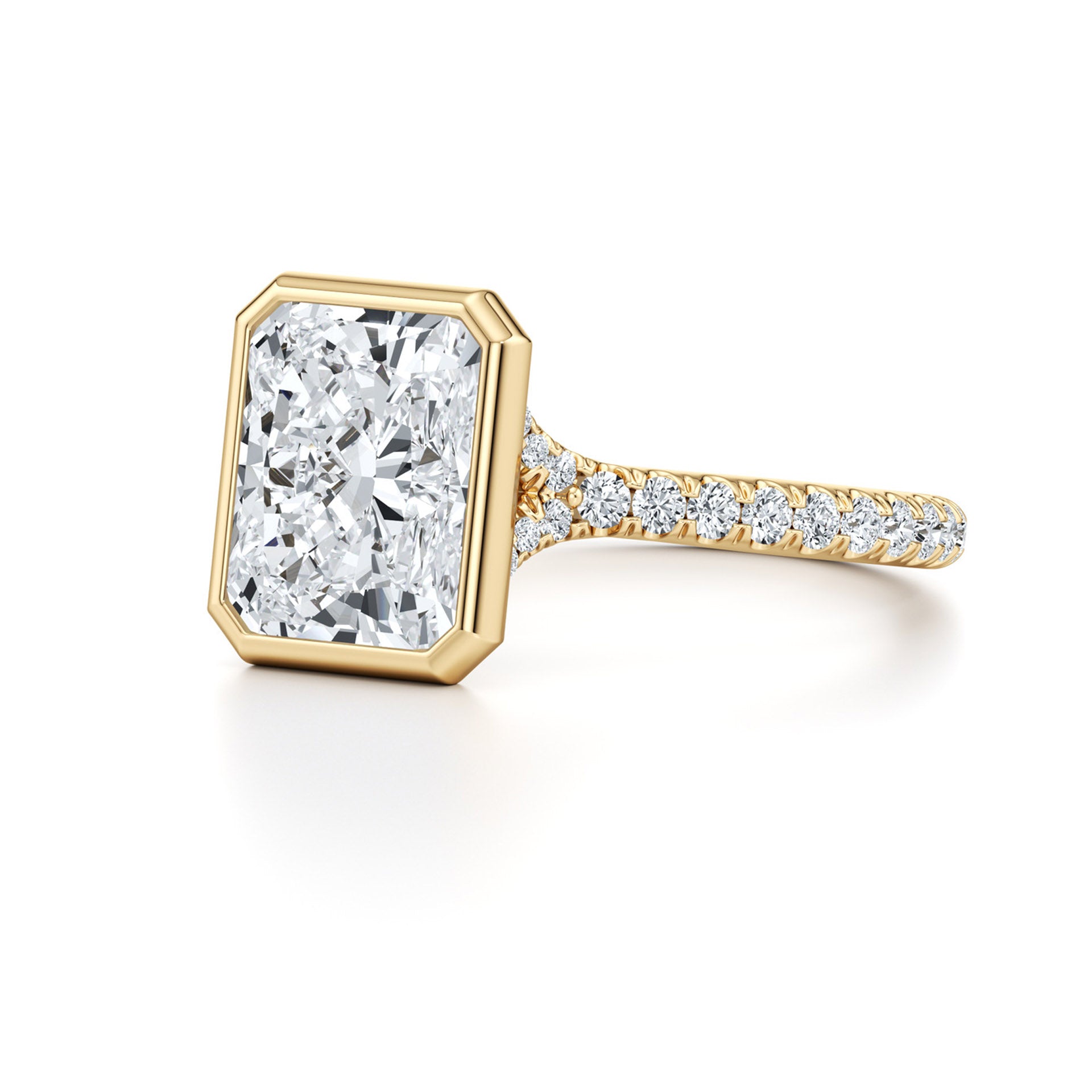 Radiant cut moissanite ring with gold band and pavé setting, premium jewelry close-up