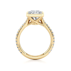 Yellow gold moissanite engagement ring with pavé band and round solitaire center stone
