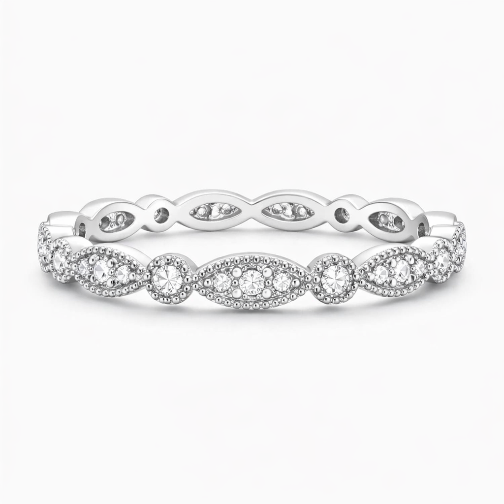 Elegant white gold moissanite eternity band with intricate marquise and round settings